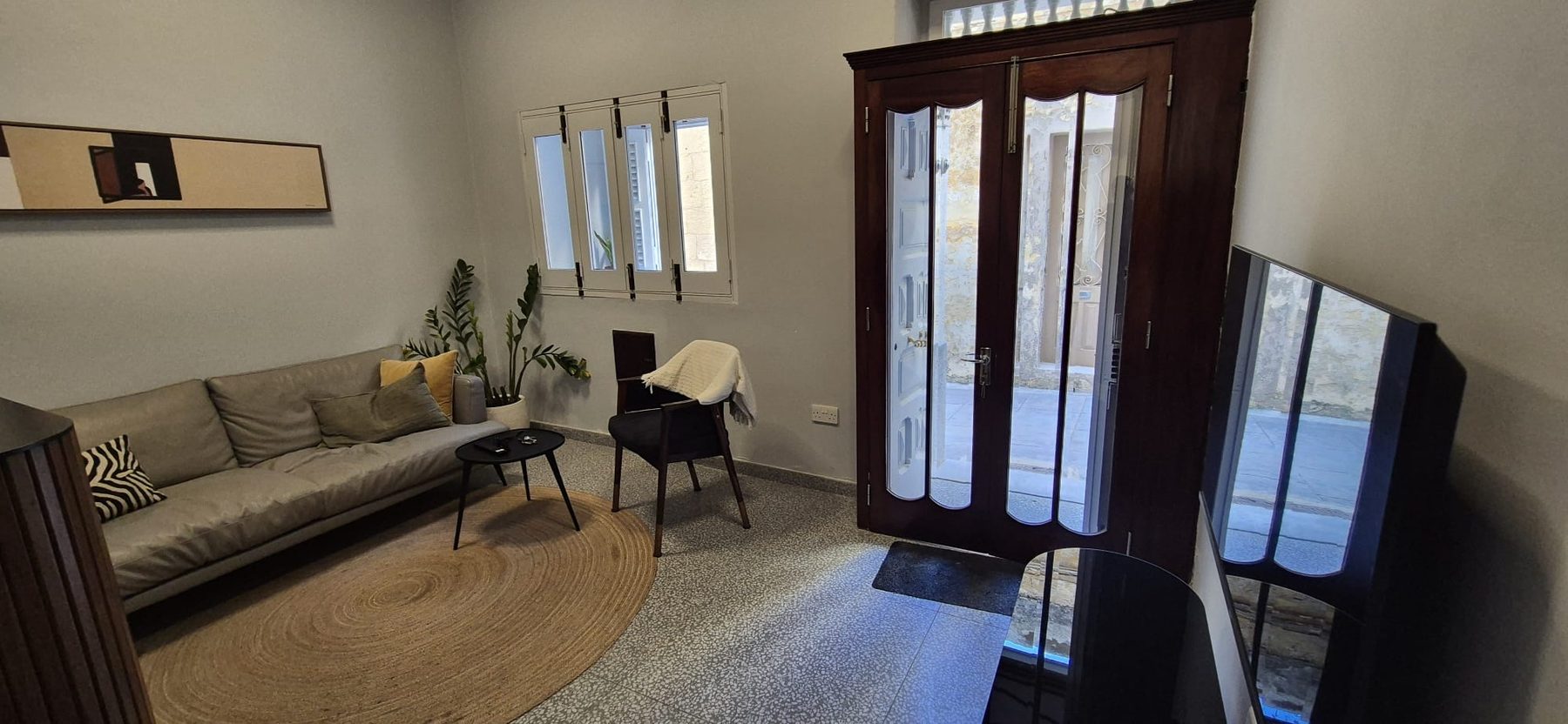 Living room with traditional Maltese door